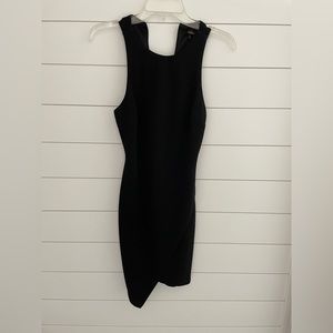 AAKAA black dress. Asymmetrical hem.